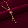 Tessara Gold-Plated Ruby-Toned Floral Dangler Pendant