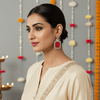 Tessara Silver-Plated Kundan Drop Earrings with Carved Coral Red Stone
