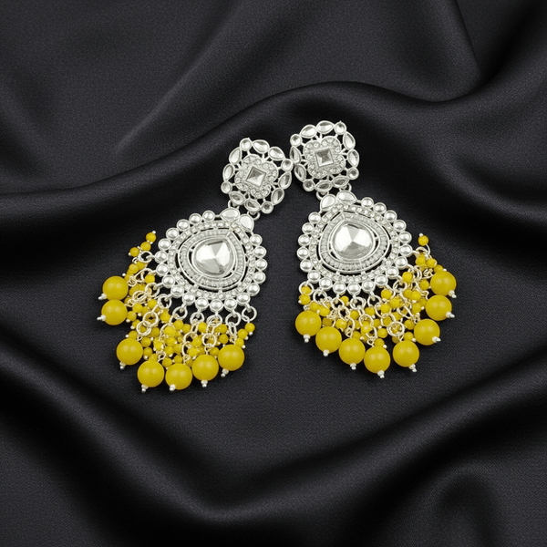 Tessara Silver-Toned Kundan Studded Drop Earrings with Yellow Beaded Drops