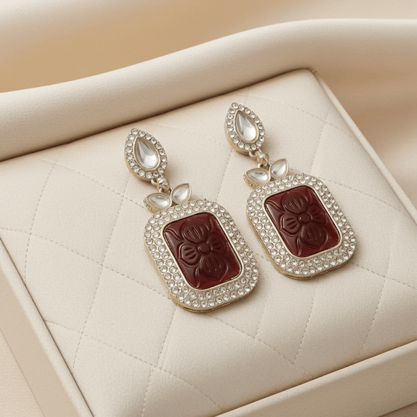 Tessara Gold-Plated Kundan Drop Earrings with Carved Maroon Stone
