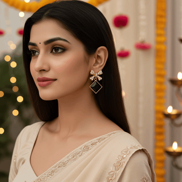 Tessara Gold-Plated Bow Drop Earrings with Black Square Stone