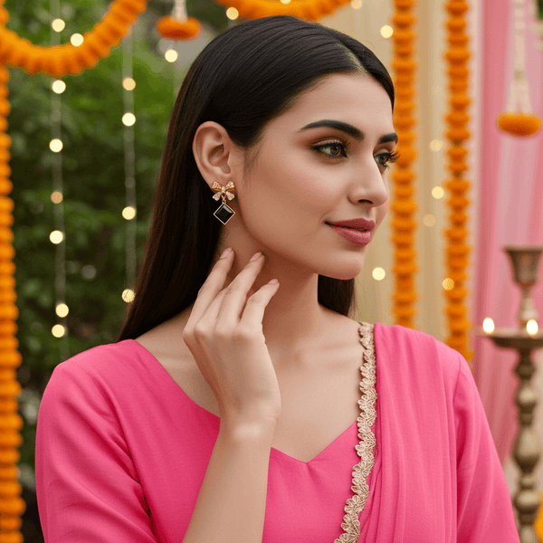 Tessara Gold-Plated Bowknot Drop Earrings with Black Square Stone