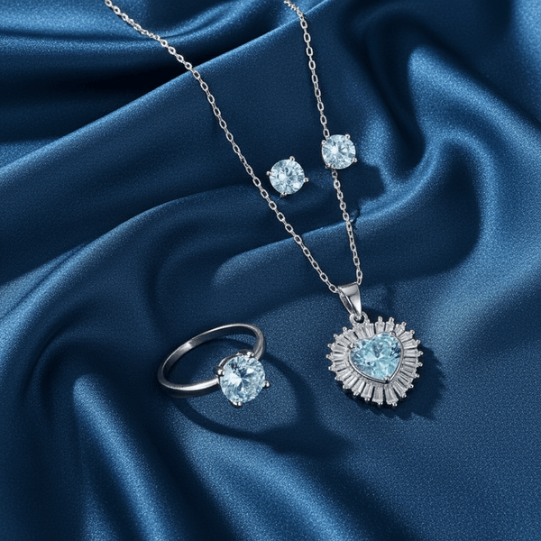 Tessara Silver-Plated Aqua Blue Baguette Heart Pendant Set with Ring