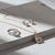 Tessara Rose Gold-Plated AD-Studded Interlocking Pendant Set with Ring
