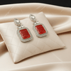 Tessara Silver-Plated Kundan Drop Earrings with Carved Coral Red Stone