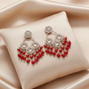 Tessara Silver-Plated Kundan Chandelier Earrings with Red Beaded Tassels