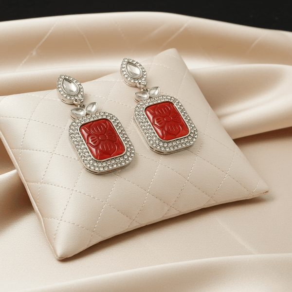 Tessara Silver-Plated Kundan Drop Earrings with Carved Coral Red Stone