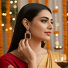 Tessara Gold-Plated Kundan Drop Earrings with Carved Maroon Stone