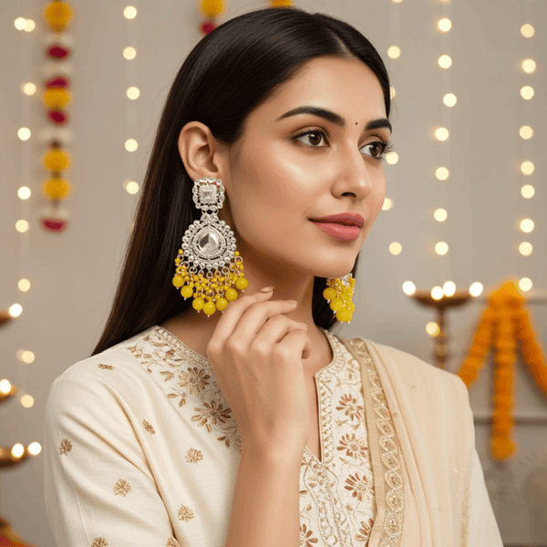 Tessara Silver-Toned Kundan Studded Drop Earrings with Yellow Beaded Drops