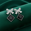 Tessara Silver-Plated Bow Drop Earrings with Black Square Stone