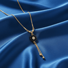 Tessara Gold-Plated Black & White AD-Studded Floral Tassel Pendant