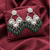 Tessara Silver-Plated Kundan Chandelier Earrings with Bottle Green Beaded Tassels