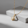Tessara Gold-Plated White AD-Studded Pearl Heart Pendant