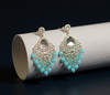 Silver-Plated Kundan Chandelier Earrings with Turquoise Blue Beaded Drops -by Tessara